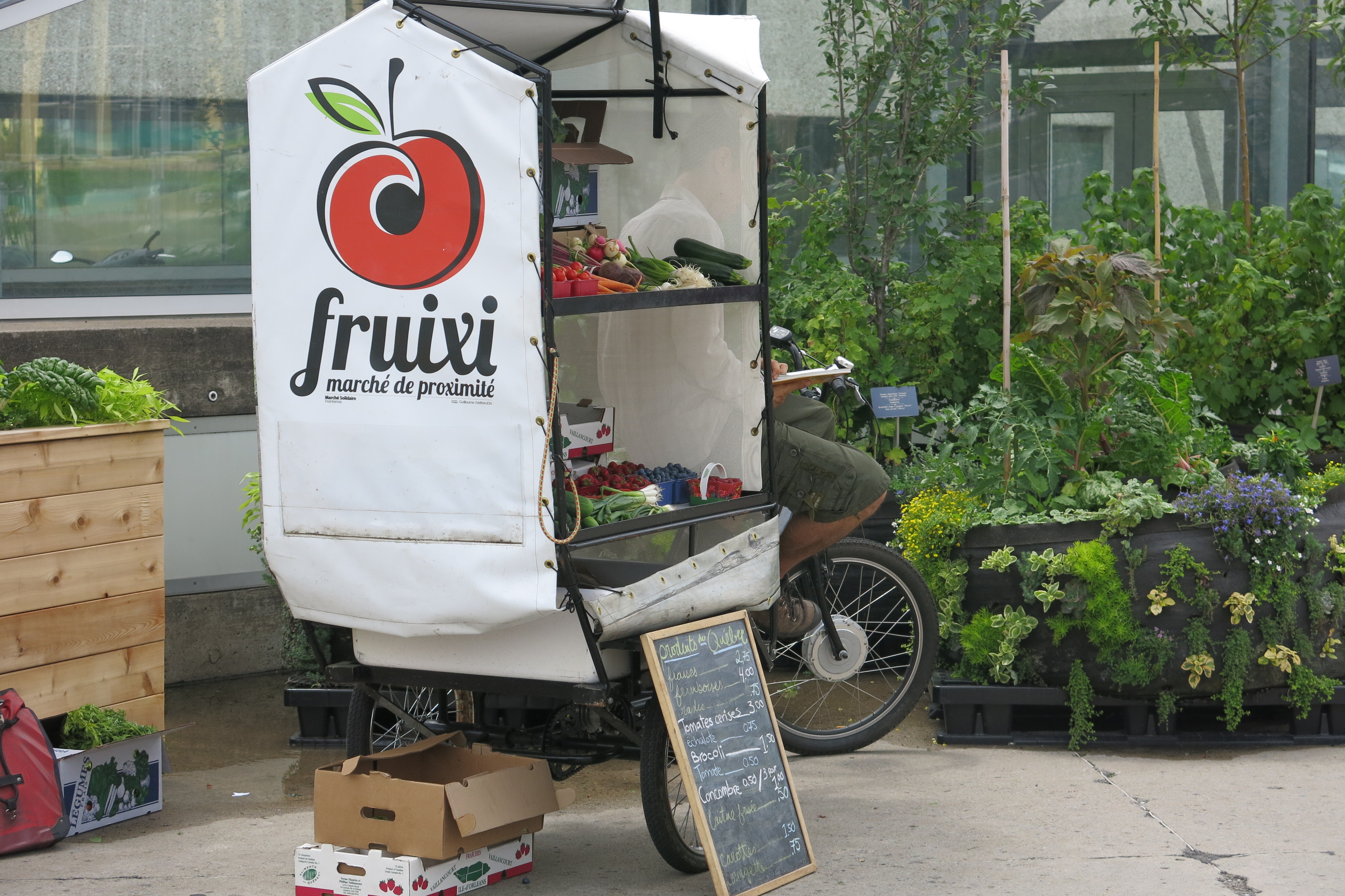 Mobile fruit stand outside Biodome, Montreal tourist attraction.